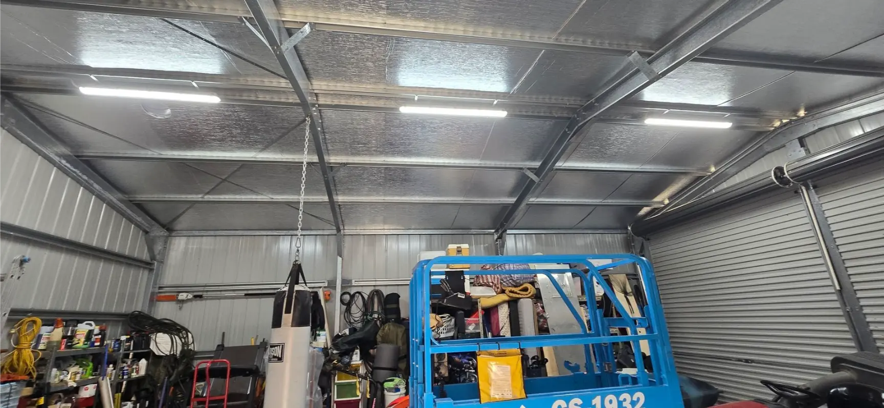 Commercial electrician working in a warehouse