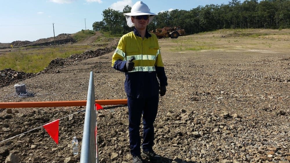 D.J. Whatley & Son electrician on a commercial site in high-vis PPE