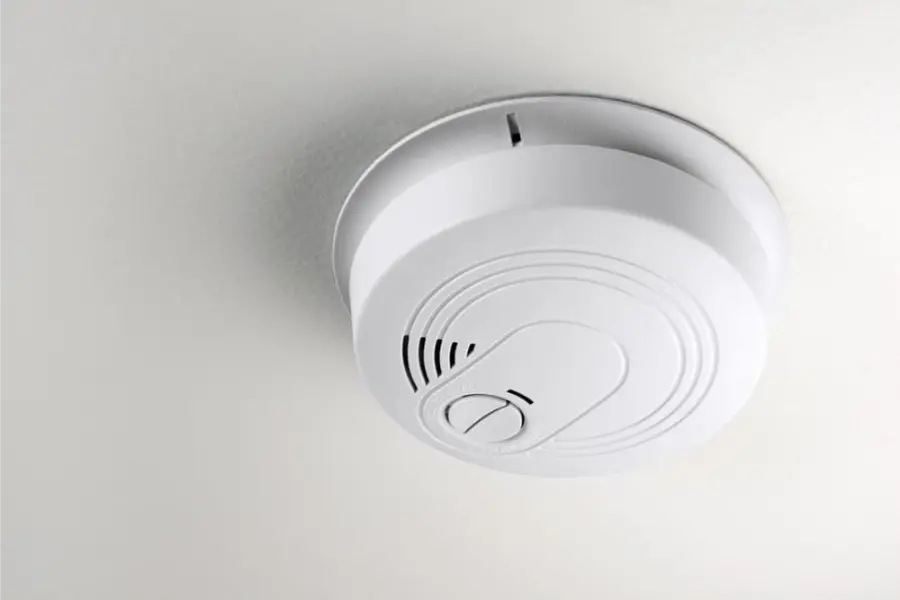 Photoelectric smoke alarm on a ceiling